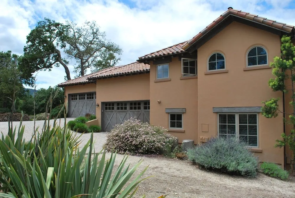 Fiberglass-clad windows on a Mediterranean-style home